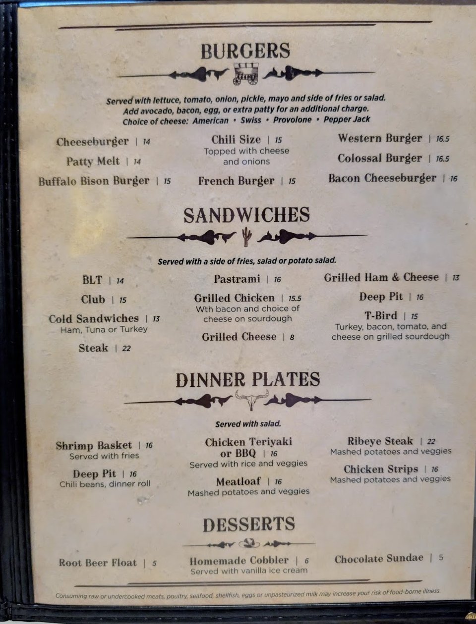 Menu-style food spread on a restaurant table.